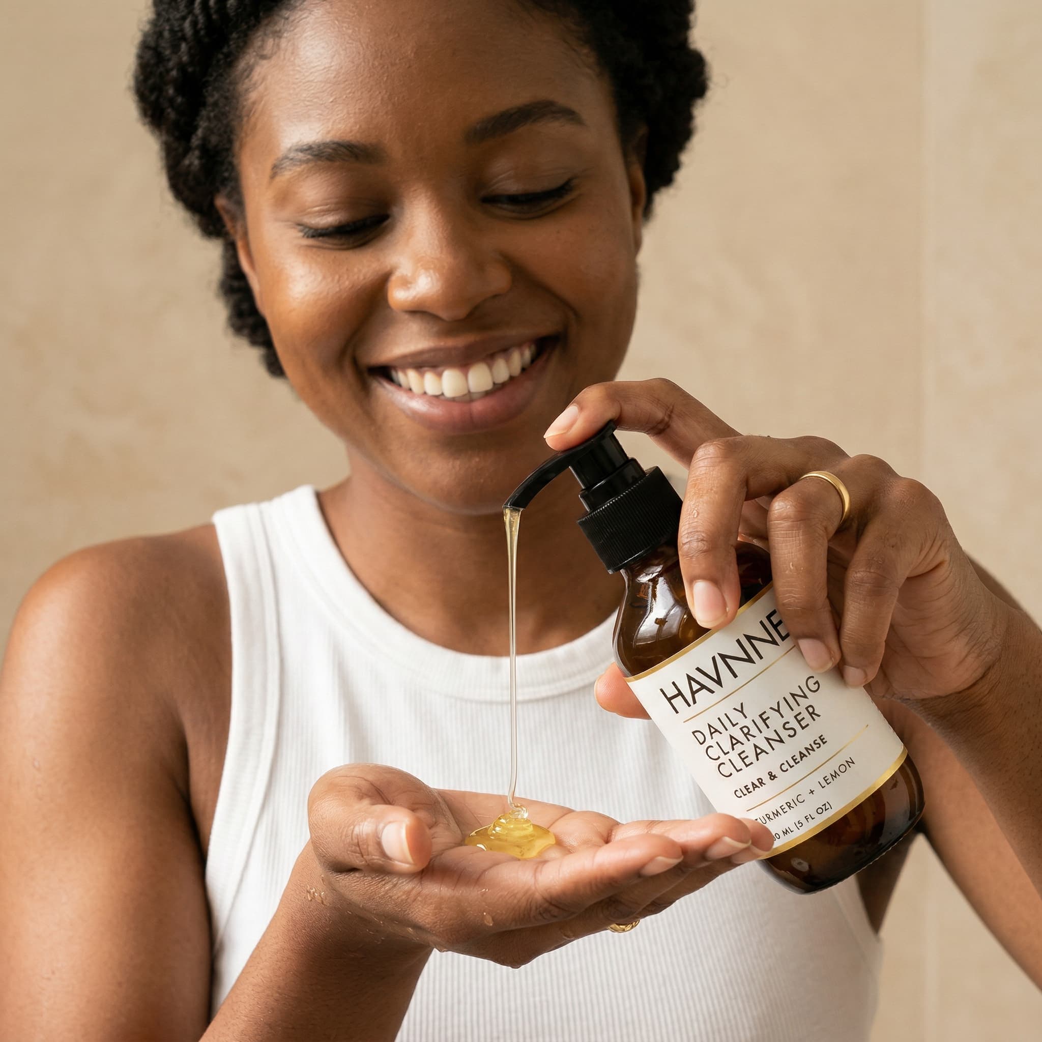 woman using cleanser